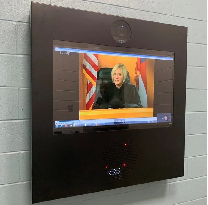 Report urges AI and video hearings to tackle court backlog